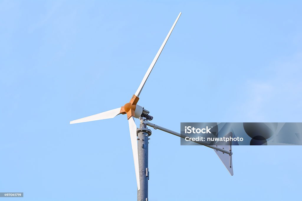 Wind power generators Wind power generators with clear blue sky. Agricultural Field Stock Photo