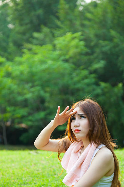 istock Woman is sitting a break from exercise. 497041789