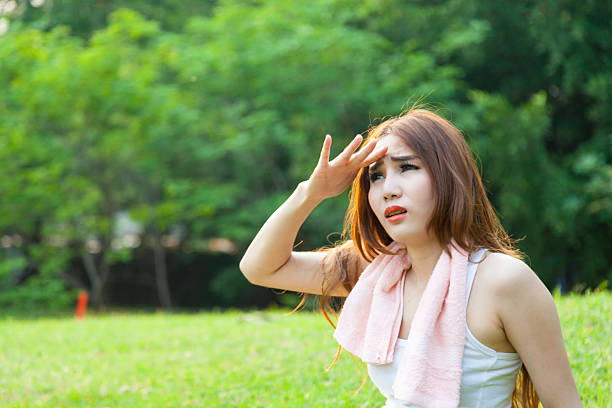 istock Woman is sitting a break from exercise. 497042399