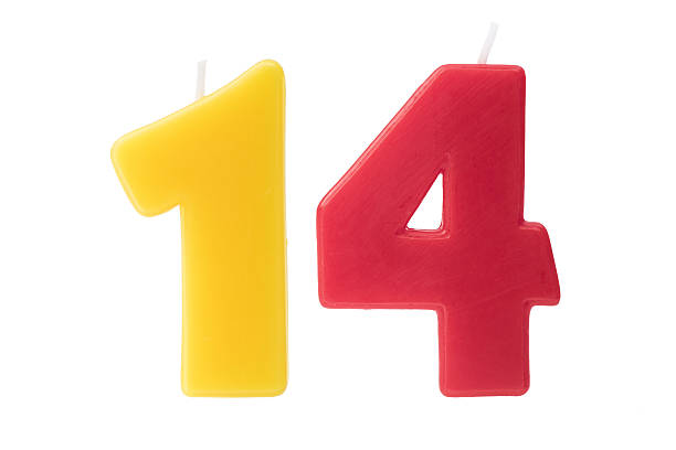 istock Fourteenth birthday candles isolated 497055142