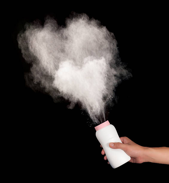istock spilled baby powder on black background 497057704