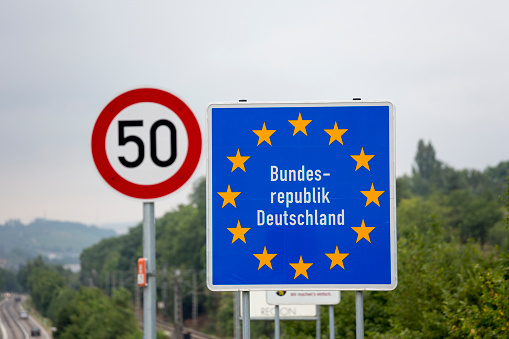 Road signs in Europe, throughout Luxembourg, France and Germany.  Information, road warning, border crossing and other types of signs in a series.  Summer in Europe.  European travel destinations.