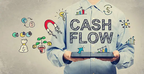 Photo of Cash Flow concept with young man holding a tablet