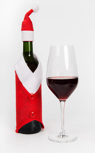 istock Wine bottle in Santa Claus's suit 497059330