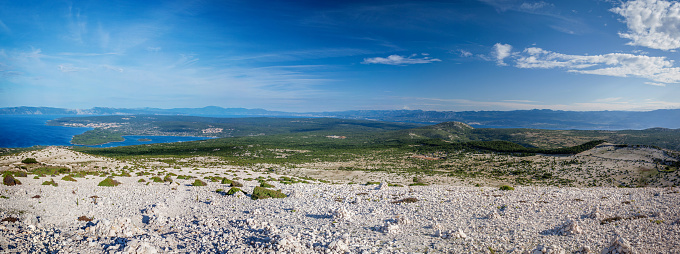 Panoramic view of the rugged but beautiful Croatian landscape from a mountain top. Shot on the island Krk in the northern Adriatic Sea.