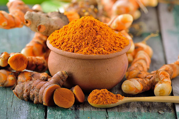 istock turmeric roots in the basket on wooden table 497062922