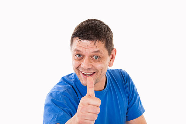 istock Man with his thumb pointing upwards - isolated 497062950
