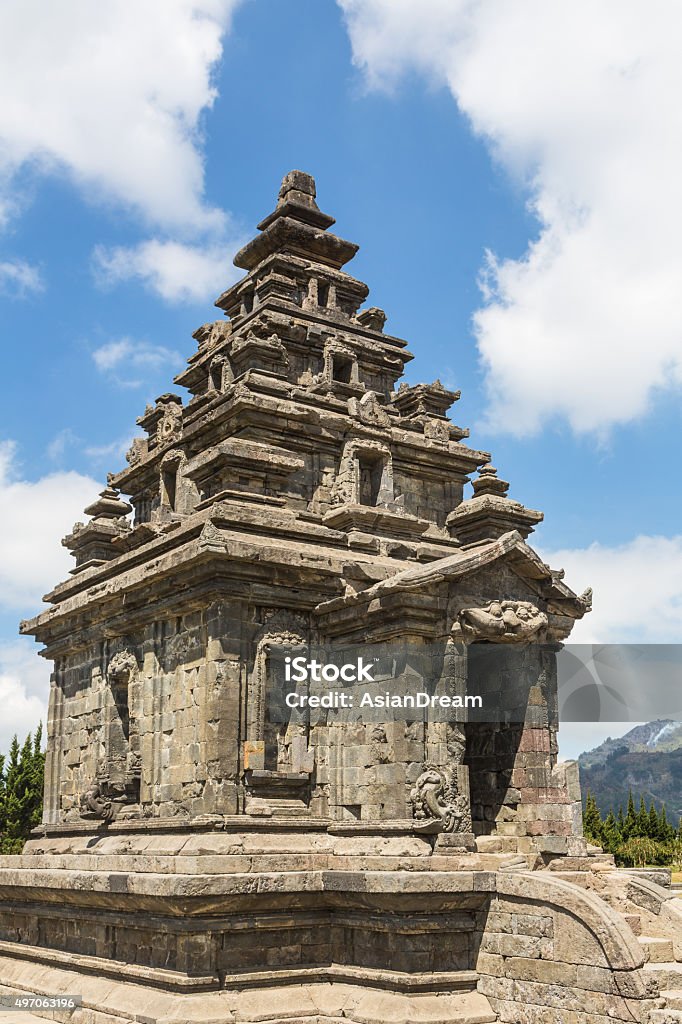 Dieng Plateau temples in Java Arjuna temple in the Dieng Plateau near Wonosobo in central Java, Indonesia. These Hindu temples are known as being among the oldest religious building in Indonesia, which is now mostly Muslim. Dieng Plateau Stock Photo