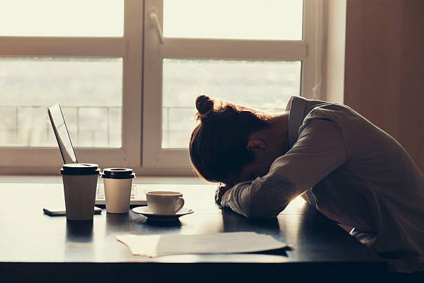 istock Tired woman in the office 497065610