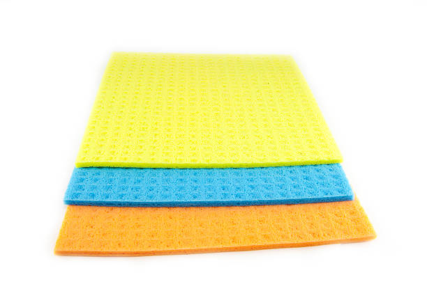 istock Sponge scouring pads on an isolated white background 497067378
