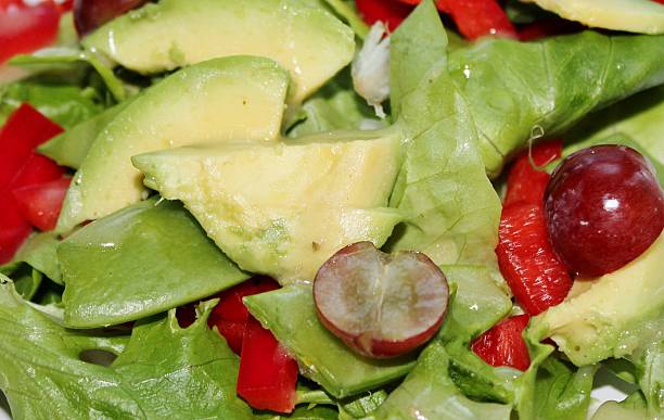 istock fresh salad with grapes and avocado 497073911