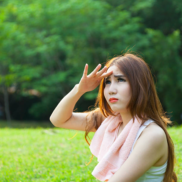 istock Woman is sitting a break from exercise. 497074271