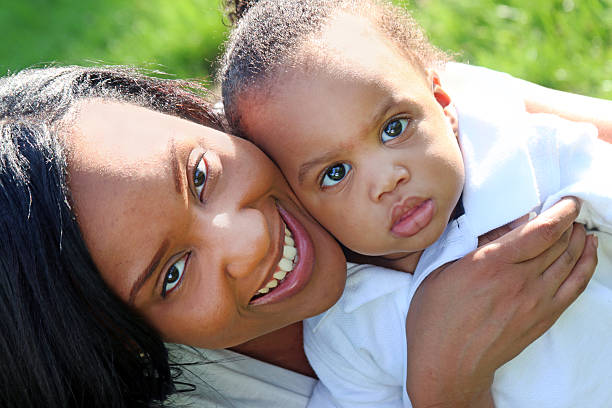 istock African American mother with child close 497077749