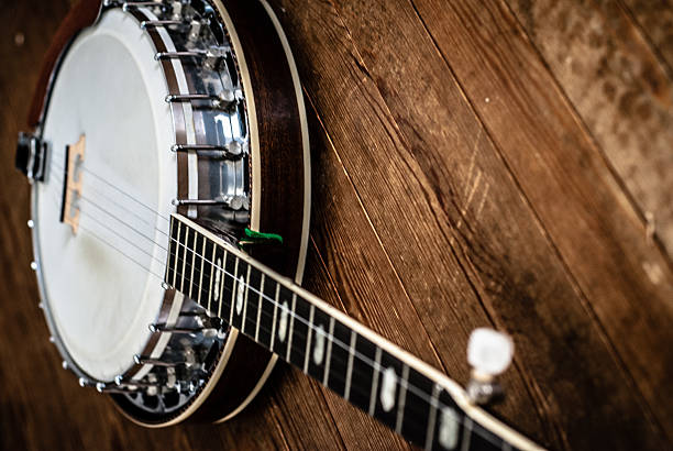 istock Five-string bluegrass banjo on distressed wooden planks. 497078969