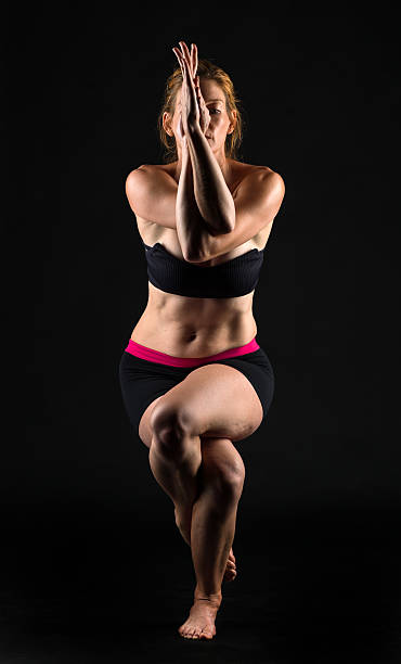 istock Mature woman practicing yoga 497079371