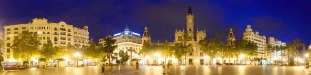 Panorama of  Placa del Ajuntament in evening. Valencia, Spain