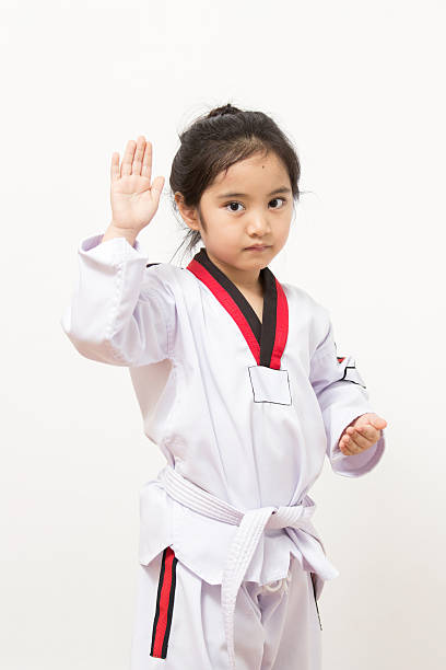 istock Little asian child in fighting action 497082333