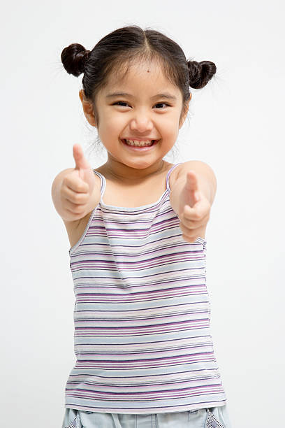istock Pretty confident girl showing thumbs up 497082337