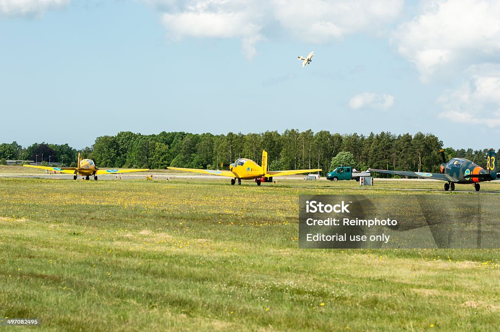 SAAB 91 Safir Kallinge, Sweden - June 01, 2014: Swedish Air Force air show 2014 at F 17 Wing. SAAB 91 Safir, Sapphire, Team sk-50. On the ground, Tummelisa in air. Air Vehicle Stock Photo