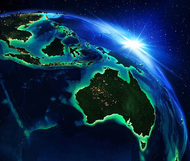 superficie en australia, y indonesia la noche - australia map fotografías e imágenes de stock