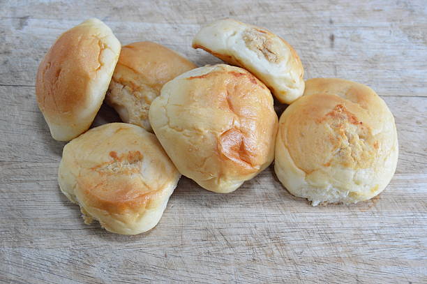istock small bun filled tuna and chicken mince on chop block 497089796