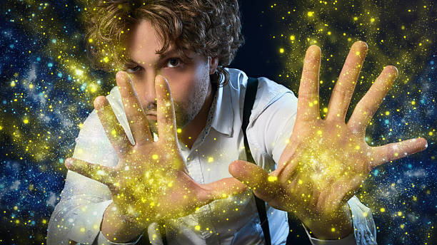 boy magician boy magician makes magic with his hands magic show stock pictures, royalty-free photos & images