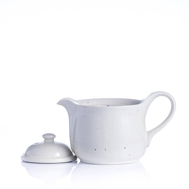 istock Japanese sake cup and bottle on white background 497090700