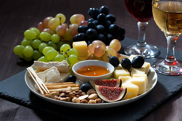 istock Plate with deli snacks and wine, closeup 497091328