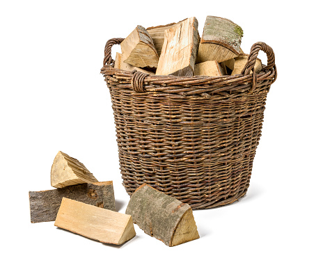 Wicker basket filled with firewood