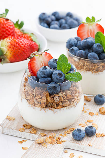 istock diet dessert with yogurt, muesli and fresh berries 497092206