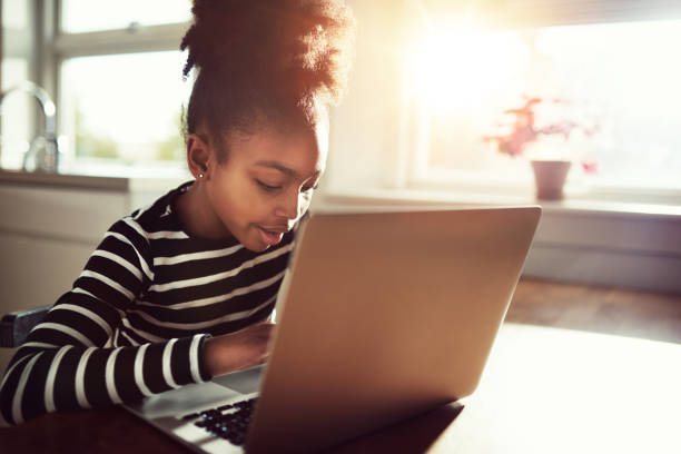 istock Young African girl amusing herself at home 497093796