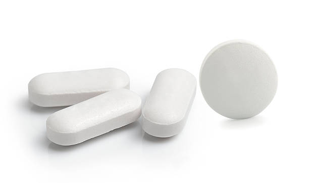 istock Medical pill tablet isolated on white background 497093980