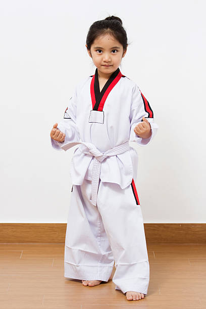istock Little asian child in fighting action 497096031