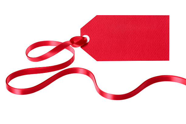 istock Red gift tag or label with ribbon isolated on white 497097414