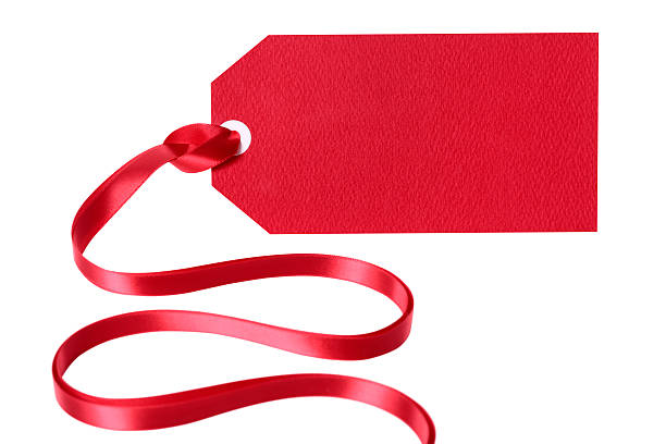 istock Red gift tag or label with ribbon isolated on white 497097502