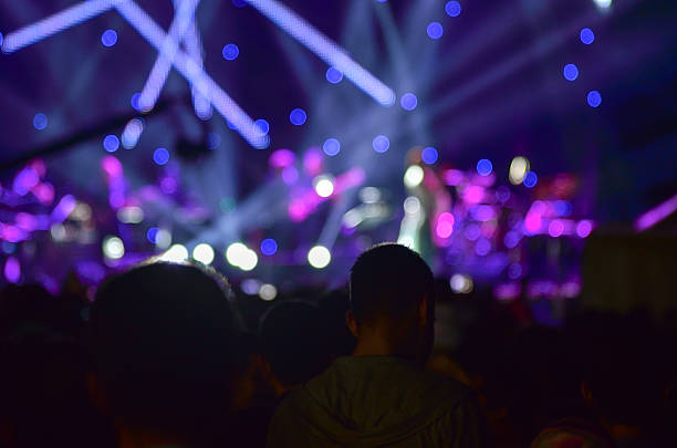 istock People watching open air concert 497098377