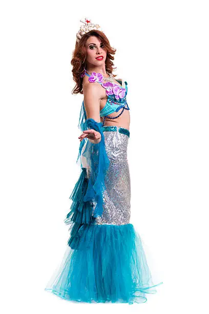 Carnival dancer woman dressed as a mermaid posing, isolated on white background in full length.