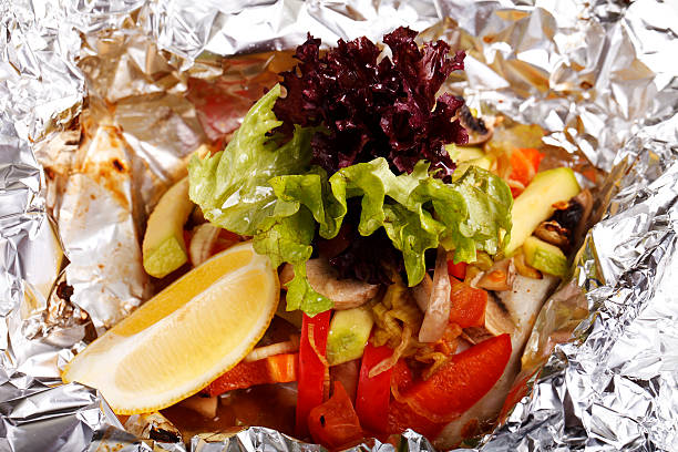 istock dish in foil , vegetables salad mushrooms 497098954