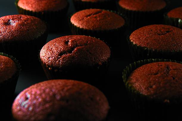 istock Freshly baked red velvet cupcakes 497099511