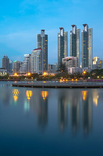istock Bangkok cityscape reflect with lake at twilight time 497099963