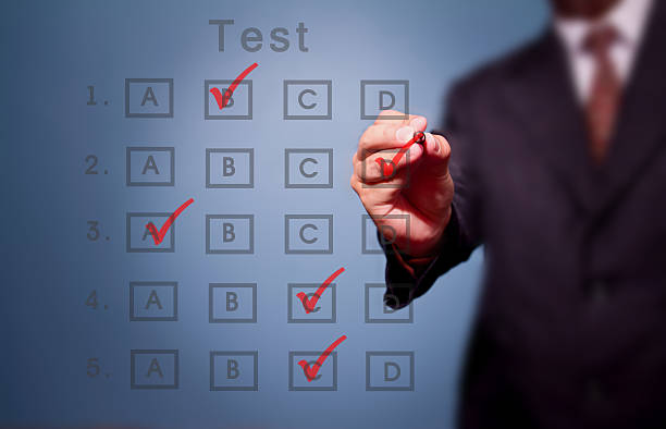 istock business man make choice on test result form 497100416