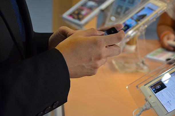 istock businessman hand holding a phone 497101781