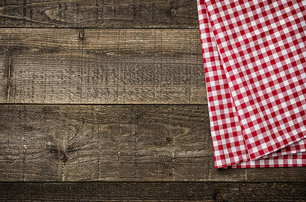 istock Rustic wooden boards with a red checkered tablecloth 497102022