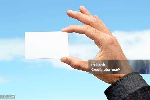 Man With A White Card In Hand Stock Photo - Download Image Now - Adult, Backgrounds, Business