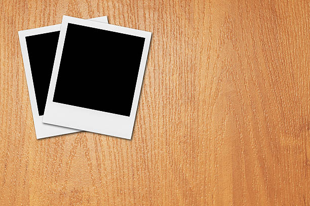 istock Blank Polaroid Photo Frames On The Desk. 497110401