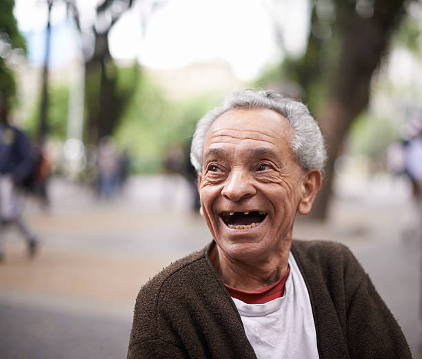 He's lived quite the life Cropped shot of smiling old man sitting outsidehttp://195.154.178.81/DATA/i_collage/pi/shoots/783255.jpg gap toothed photos stock pictures, royalty-free photos & images