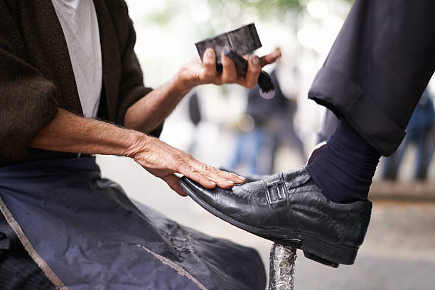 You can see your face in them Cropped shot of a shoe shiner shining a businessman&#039;s shoeshttp://195.154.178.81/DATA/i_collage/pi/shoots/783255.jpg shoe polish photos stock pictures, royalty-free photos & images