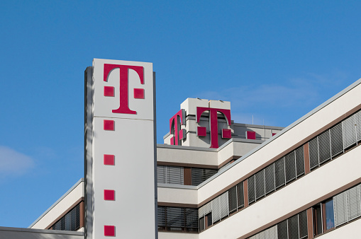 Dresden, Germany - October 24, 2013: Deutsche Telekom AG (English: German Telecom) is a German telecommunications company headquartered in Bonn and one of the largest in europe.The company has technical networks (ISDN, DSL, Satellite, Gigabit Ethernet, etc.) for the operation of information and communication services (ICTs), such as telephones (landline and mobile) or online services. The German Telekom employs worldwide 229 997 people, of which 68 276 employees in Germany.