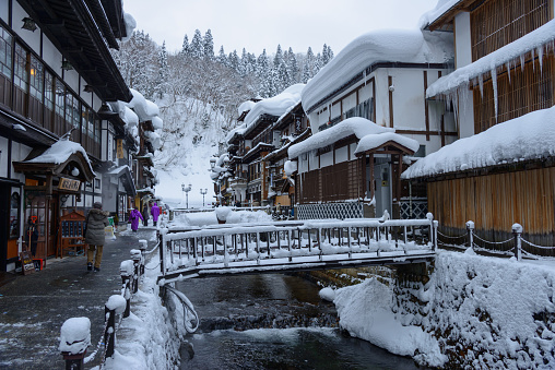 Ginzan onsen in a winter day, It is located in Obanazawa, Yamagata prefecture, Japan. The hot spring was discovered in the Middle Ages, Ryokan (inns) that remains now was built in the Taisho era.