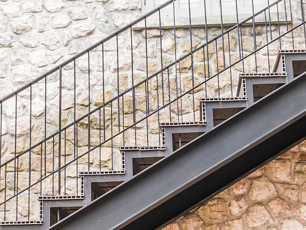 istock Stair metal and stone wall 497115640
